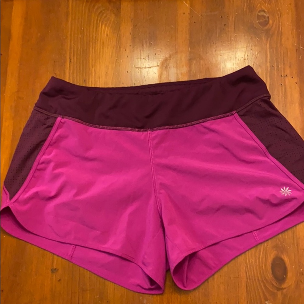Athlete pink running shorts